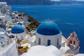 Blue dome of greek orthodox church with backround of sea on Thira (Santorini) island. © arkady_z