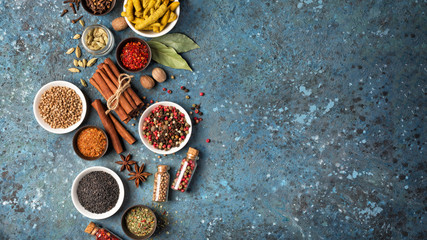 Different spices, kitchen herbs and seeds for tasty meals
