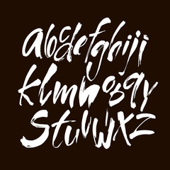 Vector Acrylic Brush Style Hand Drawn Alphabet Font. Calligraphy alphabet on a black background