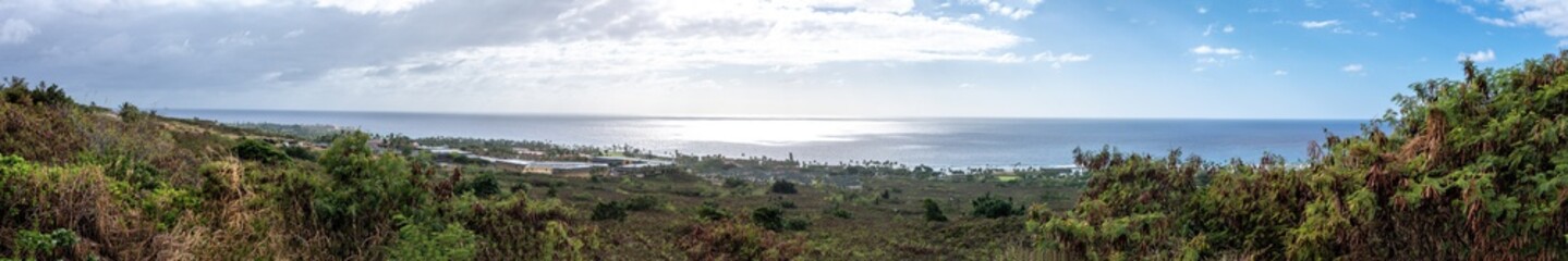 Panoramic view of a village near the ocean south of Big Island Hawaii