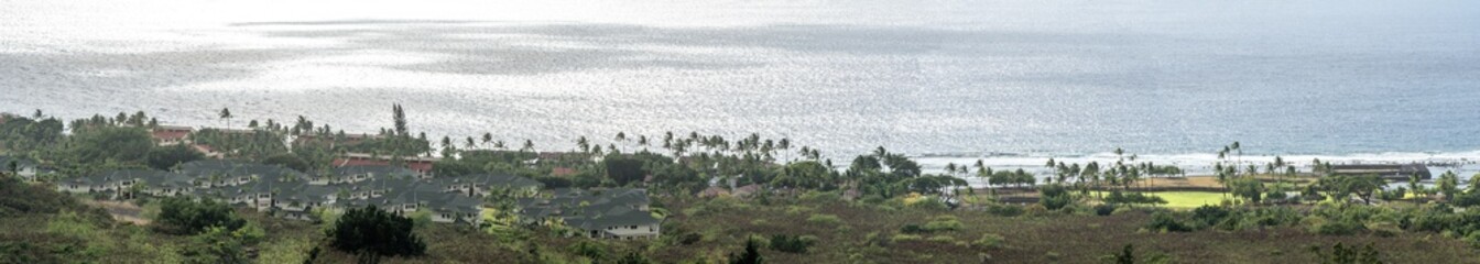 Panoramic view of a village near the ocean south of Big Island Hawaii