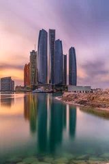 Zelfklevend Fotobehang Jumeirah at Etihad Towers , Abu Dhabi Skyline at sunset © malangusha