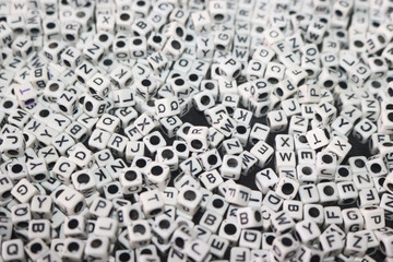 little white cubes or dices with English letters  image
