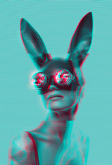 woman in a rabbit mask and biker glasses looks at the fire in glitch tv effect - obrazy, fototapety, plakaty