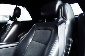 leather black car interior with suede