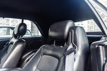 Fototapeta premium leather black car interior with suede