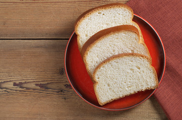 Bread on red plate
