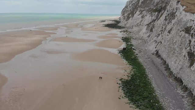 Aerial footage on the beach of Escalle, Cap Blanc Nez, France, white cliffs seeing the ferry to England in the distance