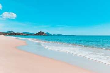 Daylight landscape of Porto Giunco' shore, soft waves, beach and sand