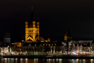 Fototapeta na wymiar Great St. Martin Cathedral and old Town Hall are visible landmarks in Cologne old town