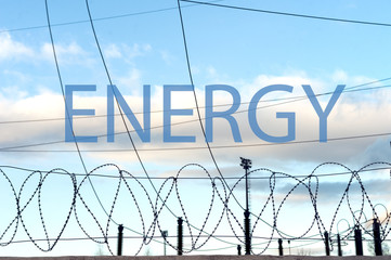 electric power behind barbed wire