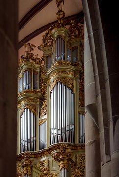 A stunningly beautiful organ in a church in Alsace. The interior of the catholic cathedral.