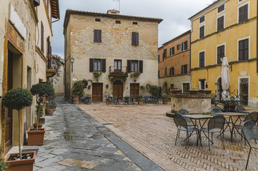 Walk on a rainy day through the streets of the beautiful town, Pienza, Tuscany
