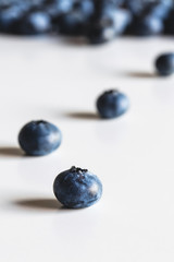 Group of fresh blueberries isolated on white background. Healthy food, health