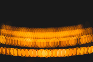 Bokeh effect  with warm light on a dark background