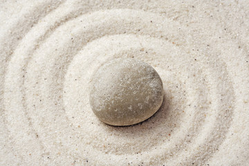 Fototapeta na wymiar Sand and stone texture background with line pattern. Minimal zen meditation garden. Concept for yoga, spa wellness or buddhism and mindfulness