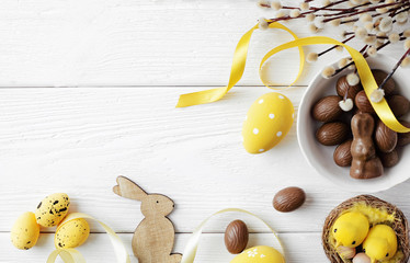 easter eggs and flowers, copy space for text