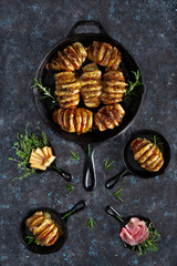 Hasselback potatoes with cheese and bacon
