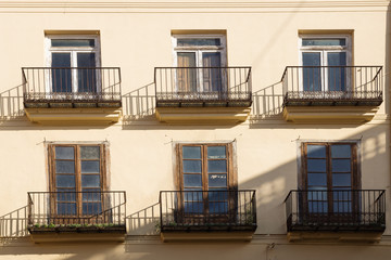 House facade of typical Spanish house with balconies, Valencia, Spain