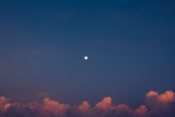 Photo of the sky at the evening, moon and clouds