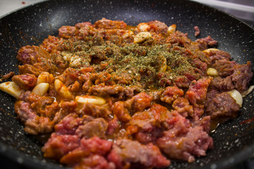 pasta cooking process spaghetti bolognese tomato paste meat and greens italian cuisine