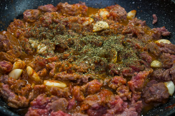 pasta cooking process spaghetti bolognese tomato paste meat and greens italian cuisine