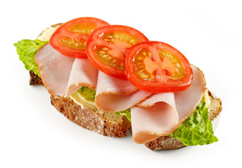 slice of bread with ham and tomato