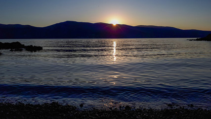 Fototapeta premium Sunset at the sea on Magneli Beach, Krk, Croatia