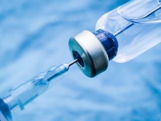 Vaccine Bottle. Medical Syringe needle in glass container storage for drugs. Medication Cure...