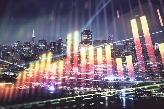Financial graph on night city scape with tall buildings background double exposure. Analysis concept. © peshkova