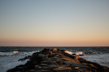 Sunset Over Rocks at Beach