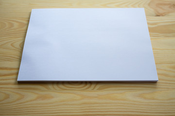 White papers size A4 on wood table texture background, Brainstorming, Creative idea, Business concept