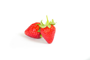 studio shoot of fresh strawberries on a white background