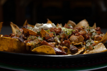 Mexican food nachos with meat 