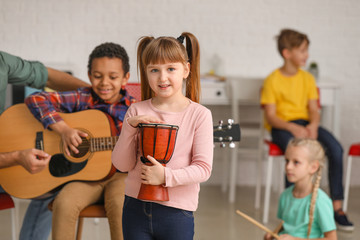 Cute little girl at music school