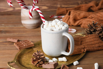 Cup of hot chocolate on wooden table