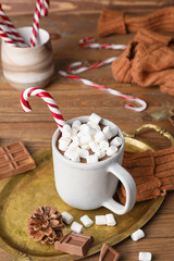 Cup of hot chocolate on wooden table