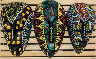 African culture tribal wooden back masks painted in colorful dots
