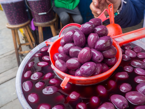 Peruvian olives or Botija olives at a local market - Powered by Adobe