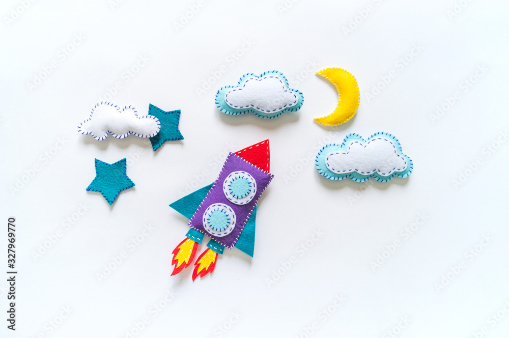 Wall mural rocket craft space toy. made from felt.