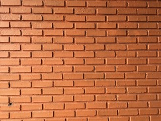 Orange brick wallpaper