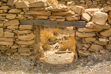 old ruined structure with a buried door frame