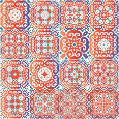 Colored antique patterns in ceramic ethnic tiles.