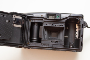 open film compact camera device on white background