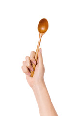 Woman hand hold a wooden spoon isolated on white.