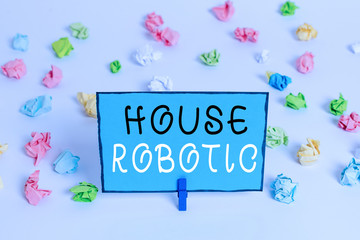 Text sign showing House Robotic. Business photo showcasing Programmable powered machines that perform household chores Colored crumpled papers empty reminder white floor background clothespin