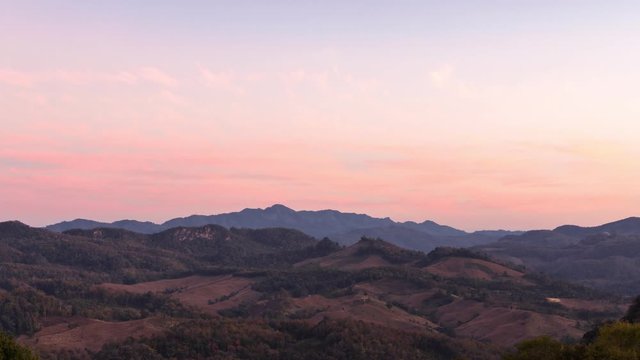 Time lapse view of colorful sunset over mountain at Mae Hong Son , Thailand.