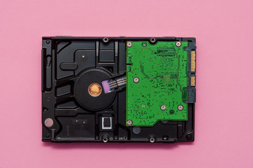 Sata hard drive on a pink background