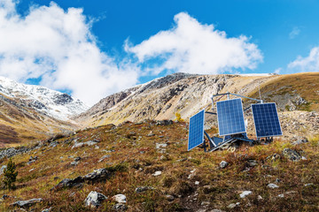Solar panels on the hillside. Aktru Valley, Severo-Chuysky ridge, Altai Republic, Russia
