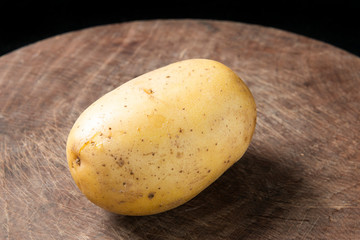 potato on wooden background